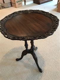 Ornate carved round walnut table 22" diam x 27" h