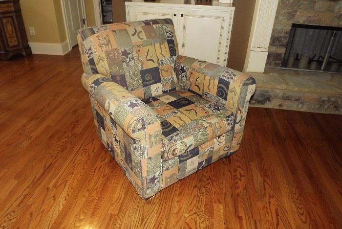 Upholstered, patterned club chair