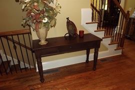 Solid wood console table, faux flower arrangement