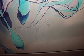 Detail of signature of framed original artwork. 