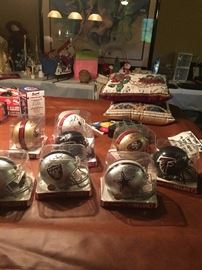 Signed Riddell mini helmets (many have certificates of authenticity), Nascar 1:18 scale collectables