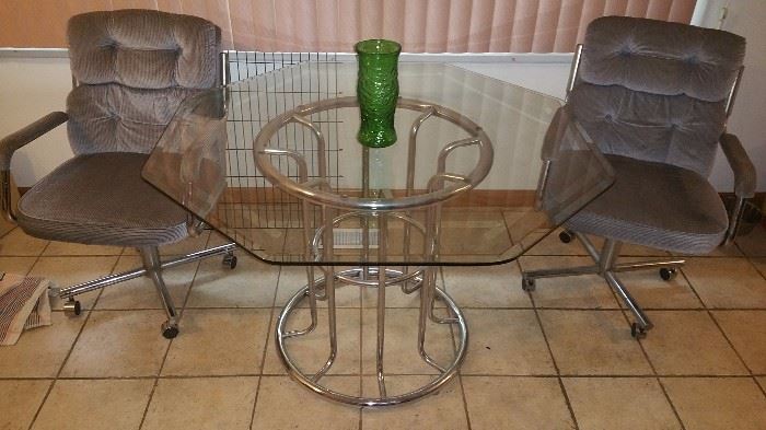 Glass Top Table with Chrome Base and 4 matching chairs (2 not pictured)