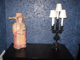 Carved wood Chinese elder and ornate metal candelabrum lamp