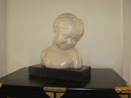 Demure young girl on stand