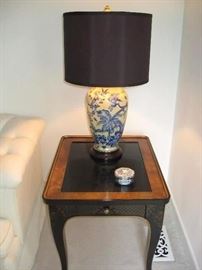 Painted side table with drawer and yellow and blue lamp
