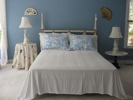 Attractive French provincial double size bed.  Could be modified to be Queen sized.  Figurine lamps and marble and iron table