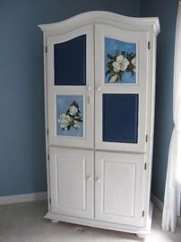 Entertainment cabinet/storage armoire.