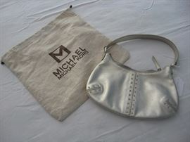 Michael Kors bling bag...other bags by other makers as well.