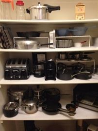 Many small appliances, pressure cooker, pots, and pans