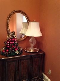 Dining room server/buffet; oval mirror; one of many lamps