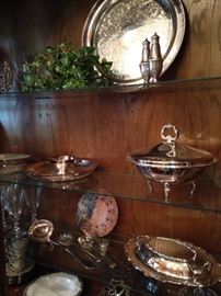 Some of the silver plate serving pieces