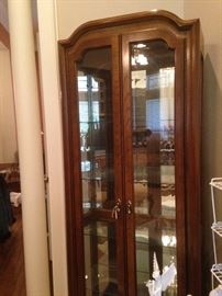 One of two matching curio cabinets (opens from front)