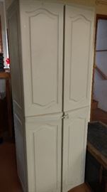 Plastic cabinet with padlock locking mechanism. 