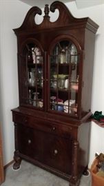 Antique Cabinet with claw feet. 