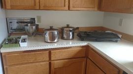 Large set of "bamboo style" stainless silverware, Revereware double pot / steamer with lid, Reverware large pot with lid, griddle. 