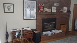 Side Tables, Oreck with rechargeable battery, tablecloths, luggage, framed prints