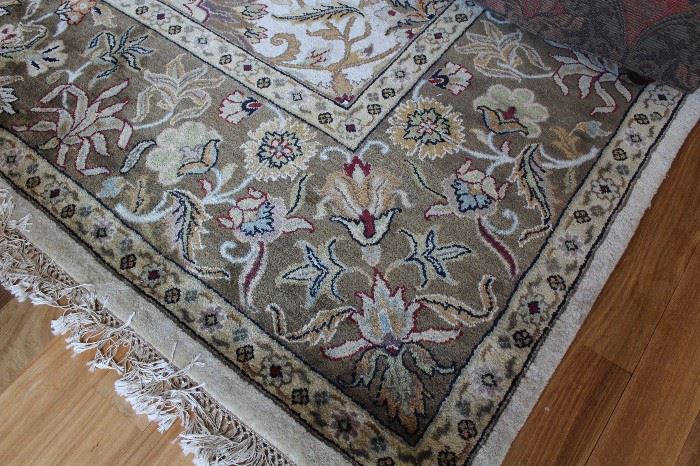 9.1 x 12.3 beautiful area rug made in India. Color noted as "Sand"