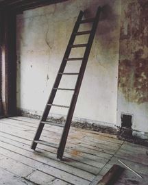 Extra tall antique ladder. 
