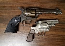 Colt Frontier Six Shooter 44  cap gun by CMC and cartridges. Also, a Gonzalez cap gun