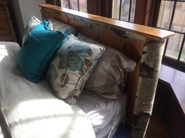 Closeup of headboard. Beautiful bedding also for sale.