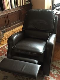 Leather swivel recliner - Like new condition.