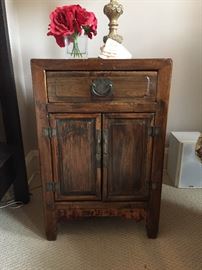 Chinese side table, used here bedside. But is a very versatile piece. There are two of these.