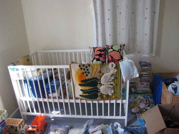 We have four cribs, exactly like this one.  Two assembled, two still unassembled.  Quadruplets? Expecting more than one grandchild?