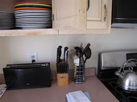 That long thin toaster everyone wants - knives fit to display on your kitchen counter and cooking utensils ready to put in a bag and unload onto your counter ready to use.