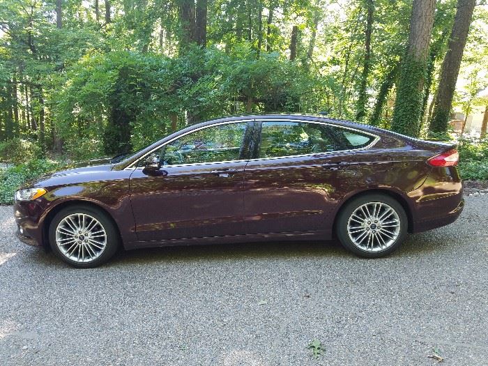 2013 Ford Fusion fully loaded.  Very low milage.