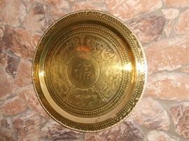 large brass wall disc
