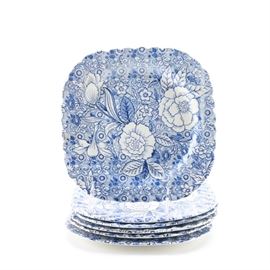 Johnson Brothers "Liberty Blue" Plates: A selection of Johnson Brothers Liberty Blue plates. This selection includes six salad plates in the Liberty Blue pattern featuring a blue and white floral design. The base of each piece is marked “Johnson Brothers England Liberty Tiffany & Co.”