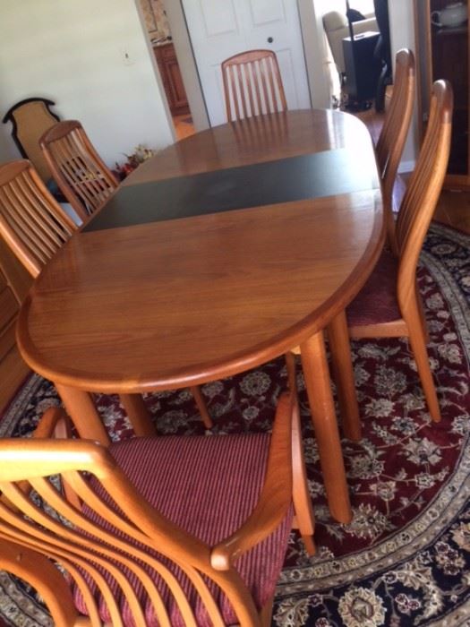 Danish Dining Room Table Teak Wood with 2 leaves and 6 chairs