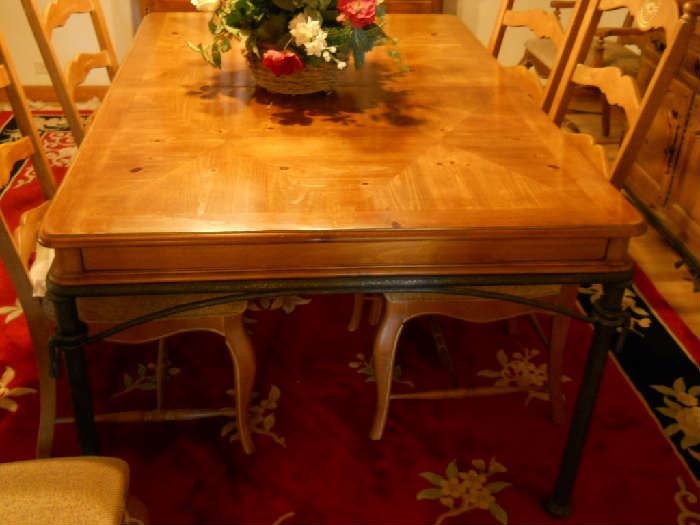 Hard wood table with wrought legs