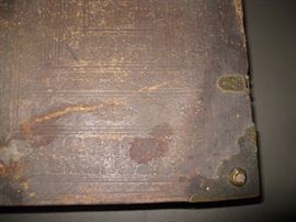 Corner of book has metal corners