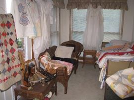 Wicker furniture, quilts, wedding dresses, Hospital bed