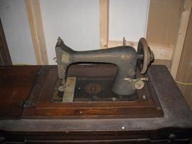 Sewing machine with cabinet