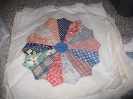Many pre made quilt squares