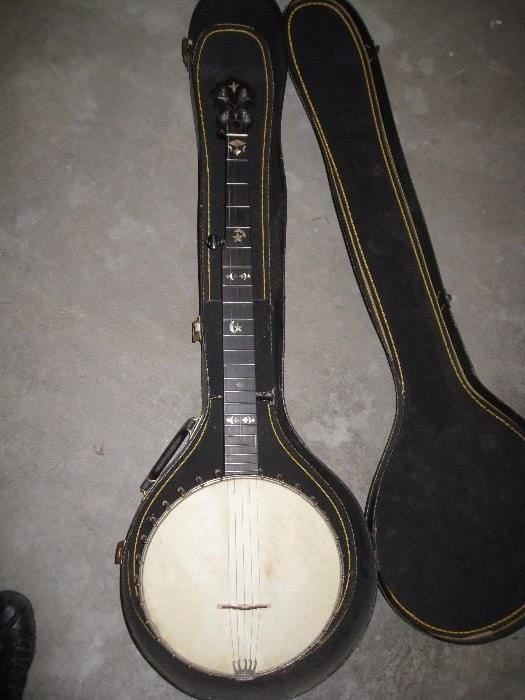 Tenor banjo with inlaid mother of pearl