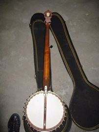 Back of mother of pearl banjo with case