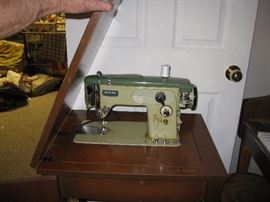Vintage sewing machine with cab