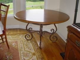 Another of the many tables...this is a 54" oak top on a cast iron base...excellent table