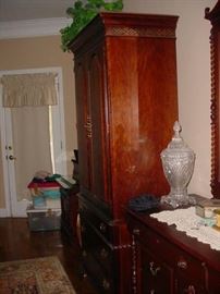 Matching armoire for the poster bedroom suite