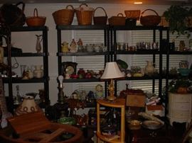 just a few of the dozens of shelving units packed full of glassware, porcelains and collectibles of every kind