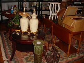 Some of the many small tables, lamps, plant stands, rugs and more