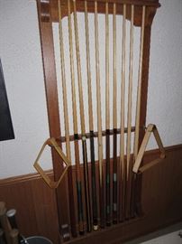 INCLUDES  CUES, 2 SETS OF BALLS, RACK AND CUE STICK WALL RACK