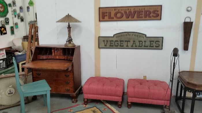 old tiger eye maple drop leaf desk w 2 hidden cubbies  $ 250, turquois wooden chair  $ 25,  2 tufted ottomans  $ 50 each,  FLOWER and VEGETABLES signs  $ 15 each,  lead shade and metal base lamp (on desk)  $ 200, floor lamp $ 35, wall basket $ 8, coffee table $ 75