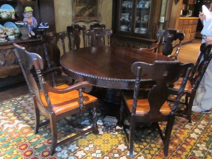 60" round Empire Table with 8 chairs (6 sides and 2 arms) and 3 leaves (12" each)
