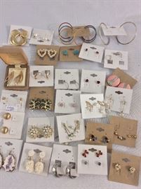 Vast collection of costume jewelry. Earrings. 