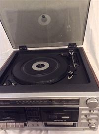 Turntable. 8-track, and cassette player. 