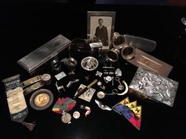 Men's sterling and gold jewelry; Sterling sewing necessaire; Sterling smoking accessories; military memorabilia; sterling silver plate and brass boxes; vintage sterling frame; sterling dresser accessories